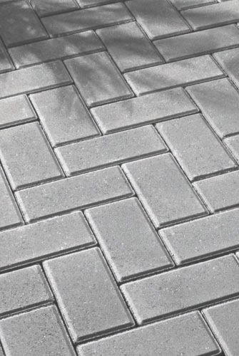 Grey Bevel Bond Pavers Installed in a Herringbone Pattern